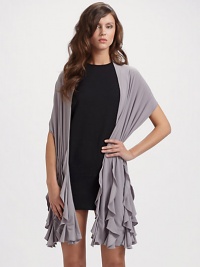 Soft jersey knit designed with waterfall ruffled trim in a convenient longer length for added coverage and style.95% polyester/5% spandex About 14 X 78 Dry clean Made in USA Soft jersey knit designed with waterfall ruffled trim in a convenient longer length for added coverage and style.95% polyester/5% spandex About 14 X 78 Dry clean Made in USA