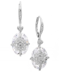 Breathtaking by design. Eliot Danori's intricate drop earrings features a faceted crystal drop decorated by a cubic zirconia-accented overlay (14 ct. t.w.). Set in silver tone mixed metal. Approximate drop: 5/8 inch. Breathtaking by design. Eliot Danori's intricate drop earrings features a faceted crystal drop decorated by a cubic zirconia-accented overlay (14 ct. t.w.). Set in silver tone mixed metal. Approximate drop: 5/8 inch.