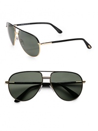 Must-have aviator frames crafted in lightweight metal with tubular temples. Available in black-gold with polarized green lens.Tubular temples100% UV protectionMade in Italy