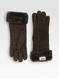 Classic cuffed style in soft suede with luxuriously warm shearling lining. Front logo tab detail About 11 long Dry clean by leather specialist Imported Fur origin: Spain Classic cuffed style in soft suede with luxuriously warm shearling lining. Front logo tab detail About 11 long Dry clean by leather specialist Imported Fur origin: Spain
