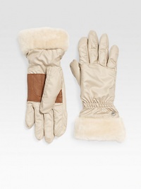 Keep your hands extra warm in this stylish nylon design with plush shearling cuff and easy-grip deerskin palm. Dyed sheepskin shearlingCinched wristAbout 10½ longPolyester; dry cleanImportedFur origin: Spain