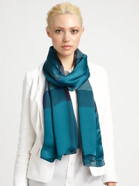 A sumptuous silk wrap is adorned with a large check print for unmistakable style.Silk27.5 X 75Dry cleanImported A sumptuous silk wrap is adorned with a large check print for unmistakable style.Silk27.5 X 75Dry cleanImported