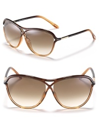 These Tom Ford aviator sunglasses are a sleek, criss-crossed update of a favorite classic style. These Tom Ford aviator sunglasses are a sleek, criss-crossed update of a favorite classic style.