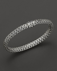 Intricately woven sterling silver from the John Hardy Chain collection. Intricately woven sterling silver from the John Hardy Chain collection.