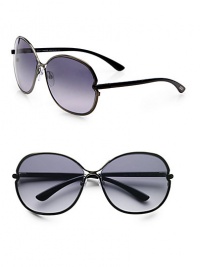 Sleek, shiny metal frames in a modern, round shape. Available in shiny gunmetal with smoke gradient lens. 100% UV protectionMade in Italy Sleek, shiny metal frames in a modern, round shape. Available in shiny gunmetal with smoke gradient lens. 100% UV protectionMade in Italy