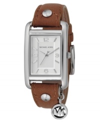 This chic watch from Michael Kors in full-grain leather and brushed stainless steel makes a playful nod to retro luggage aesthetics. This chic watch from Michael Kors in full-grain leather and brushed stainless steel makes a playful nod to retro luggage aesthetics.