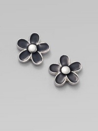 A sweet, delicate floral design to adorn the ears.Epoxy 10K goldplated brass Diameter, about ½ 14K gold filled post backs Imported A sweet, delicate floral design to adorn the ears.Epoxy 10K goldplated brass Diameter, about ½ 14K gold filled post backs Imported
