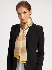 Bold stripes adorn a sumptuous silk wrap with logo detail and eyelash fringe.Silk23 X 71Dry cleanImported Bold stripes adorn a sumptuous silk wrap with logo detail and eyelash fringe.Silk23 X 71Dry cleanImported