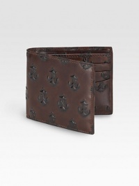Sporty and nautically-inspired in vegetable-dyed cowhide leather lined in tattoo-printed linen. Bill compartment, six credit card slots 4W X 3½H Imported Sporty and nautically-inspired in vegetable-dyed cowhide leather lined in tattoo-printed linen. Bill compartment, six credit card slots 4W X 3½H Imported