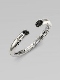 From the Bamboo Collection. A medium cuff accented with black sapphire adorned ends. Black sapphiresSterling silverKick mechanism closureDiameter, about 2¼Imported 