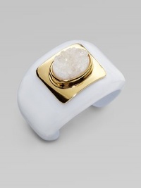 A chunky center stone of druzy quartz set in 14k goldplating on a glossy resin bangle for a modern appeal. Druzy quartz14K goldplatingResinDiameter, about 2½Slip-on styleMade in USA A chunky center stone of druzy quartz set in 14k goldplating on a glossy resin bangle for a modern appeal. Druzy quartz14K goldplatingResinDiameter, about 2½Slip-on styleMade in USA