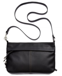 Wear with t-shirt and jeans or your favorite frilly frock, this versatile crossbody from Tignanello is the ultimate accessory. Clean lines, buttery-soft leather and subtle detail stitching grace the outside, while plenty of pockets and card slots inside can make your life feel more pulled together. Wear with t-shirt and jeans or your favorite frilly frock, this versatile crossbody from Tignanello is the ultimate accessory. Clean lines, buttery-soft leather and subtle detail stitching grace the outside, while plenty of pockets and card slots inside can make your life feel more pulled together.