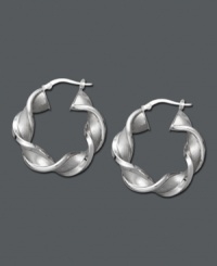 Tired of the same old style? Add a twist! These chic, hoop earrings feature a twisted design in 14k white gold. Approximate diameter: 1-1/4 inches. Tired of the same old style? Add a twist! These chic, hoop earrings feature a twisted design in 14k white gold. Approximate diameter: 1-1/4 inches.