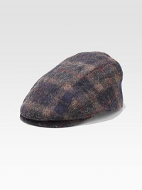 A country-club style revs up for a modern era of dressing in plaid-checked wool. Satin lining Wool Spot clean Made in USA A country-club style revs up for a modern era of dressing in plaid-checked wool. Satin lining Wool Spot clean Made in USA