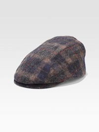 A country-club style revs up for a modern era of dressing in plaid-checked wool. Satin lining Wool Spot clean Made in USA 