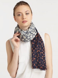 A printed style in luxuriously lightweight wool. WoolAbout 22 X 75Dry cleanImported A printed style in luxuriously lightweight wool. WoolAbout 22 X 75Dry cleanImported