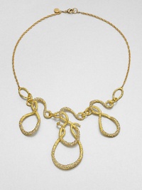 From the Elements Siyabona Collection. A modern melange of swirling loops and squiggles, in textured goldtone set with tiny Swarovski crystals for a subtle shimmer, hanging from a delicate golden chain.CrystalGoldtoneLength, about 18Lobster claspMade in USA