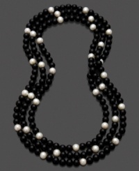 Black and white collide with classic contrast in this distinguished onyx and cultured freshwater pearl (8-9mm) necklace. Approximate length: 64 inches.