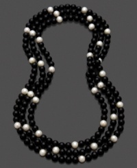 Black and white collide with classic contrast in this distinguished onyx and cultured freshwater pearl (8-9mm) necklace. Approximate length: 64 inches. Black and white collide with classic contrast in this distinguished onyx and cultured freshwater pearl (8-9mm) necklace. Approximate length: 64 inches.