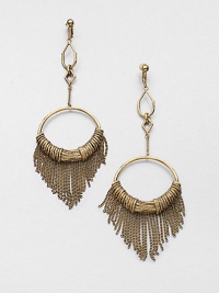 Dramatic in scale and in detail, this striking drop design combines large and small geometric loops, the largest one wrapped with golden ropes and dangling chain fringe.GoldplatedPost backMade in France Dramatic in scale and in detail, this striking drop design combines large and small geometric loops, the largest one wrapped with golden ropes and dangling chain fringe.GoldplatedPost backMade in France