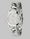 EXCLUSIVELY AT SAKS. From the Urban Collection. A stunning timepiece that adds a little sparkle to every minute. Quartz movement Water-resistant to 10 ATM Swarovski crystal accents along outer edge of case Round stainless steel case; 38mm diameter (1.5) White dial with bar hour markers and bold Arabic numerals Date display at 4:30 position Second hand Polished stainless steel link bracelet; width 17mm (.67) Foldover clasp Imported