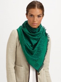 An ultra-cozy, jacquard wool scarf is embellished with logo pattern and eyelash fringe.Merino woolAbout 82 X 25Dry cleanImported An ultra-cozy, jacquard wool scarf is embellished with logo pattern and eyelash fringe.Merino woolAbout 82 X 25Dry cleanImported
