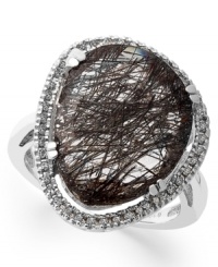Organically chic. An asymmetrical black rutilated quartz (11-3/4 ct. t.w.) pops against a frame of round-cut diamonds (1/4 ct. t.w.) in this unique statement ring. Set in sterling silver. Size 7. Organically chic. An asymmetrical black rutilated quartz (11-3/4 ct. t.w.) pops against a frame of round-cut diamonds (1/4 ct. t.w.) in this unique statement ring. Set in sterling silver. Size 7.