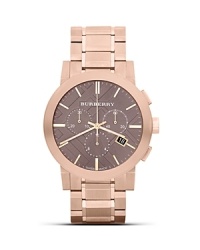 Crafted of brushed stainless steel with a rose gold finish, this round watch from Burberry is a sleek yet sophisticated piece of hardware. Crafted of brushed stainless steel with a rose gold finish, this round watch from Burberry is a sleek yet sophisticated piece of hardware.