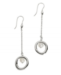 Style, polish, and subtlety combine in these elegant Breil earrings. A white natural pearl and chic cut-out design serve as the focal point in a polished stainless steel setting. Approximate drop: 1/2 inch. Style, polish, and subtlety combine in these elegant Breil earrings. A white natural pearl and chic cut-out design serve as the focal point in a polished stainless steel setting. Approximate drop: 1/2 inch.