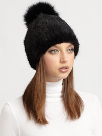 Destined to turn heads, a natural mink hat with a plush, dyed fox-fur pom pom. Dry clean by fur specialistImportedMink fur origin: DenmarkFox fur origin: China Destined to turn heads, a natural mink hat with a plush, dyed fox-fur pom pom. Dry clean by fur specialistImportedMink fur origin: DenmarkFox fur origin: China