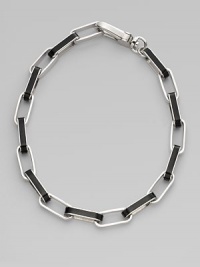A chunky, statement piece with wide, enamal accented links. Plated brassEnamelLength, about 18¾Large lobster clasp closureImported A chunky, statement piece with wide, enamal accented links. Plated brassEnamelLength, about 18¾Large lobster clasp closureImported