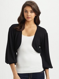 Sculptural and chic, finished with dramatic bolero sleeves.Rib-knit edges and cuffsThree-quarter blouson sleevesAbout 15 from shoulder to hemRayonImportedDry clean Sculptural and chic, finished with dramatic bolero sleeves.Rib-knit edges and cuffsThree-quarter blouson sleevesAbout 15 from shoulder to hemRayonImportedDry clean