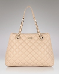 kate spade new york's chain-trimmed leather tote brings the urban cool. Whether work or weekend, style this roomy bag with sleek basics to work citified polish. kate spade new york's chain-trimmed leather tote brings the urban cool. Whether work or weekend, style this roomy bag with sleek basics to work citified polish.