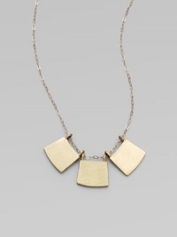 Like nautical flags stacked along a mainsail, three brushed golden discs hang demurely from a graceful golden chain.Goldtone and brassLength, about 17 with 2 extender chainHook claspMade in USA Like nautical flags stacked along a mainsail, three brushed golden discs hang demurely from a graceful golden chain.Goldtone and brassLength, about 17 with 2 extender chainHook claspMade in USA