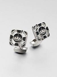 Undeniably stylish cuff links custom-fit for a king and designed in rhodium-plated brass with an enamel center and Swarovski crystal accents.Brass/enamel/Swarovski crystalsAbout ½ x ¾Made in the United Kingdom Undeniably stylish cuff links custom-fit for a king and designed in rhodium-plated brass with an enamel center and Swarovski crystal accents.Brass/enamel/Swarovski crystalsAbout ½ x ¾Made in the United Kingdom