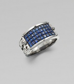 A tapered design in rhodium plated sterling silver is defined by four rows of tiny blue sapphires.Sterling silverBlue sapphiresAbout 1½ diamImported