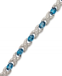 The perfect gift. Both symbolic and stylish, this XO tennis bracelet features oval-cut London blue topaz (7-1/2 ct. t.w.) and sparkling diamond accents in sterling silver. Approximate length: 7 inches. The perfect gift. Both symbolic and stylish, this XO tennis bracelet features oval-cut London blue topaz (7-1/2 ct. t.w.) and sparkling diamond accents in sterling silver. Approximate length: 7 inches.