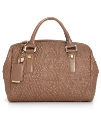 Ladies who lunch know that a chic satchel is an absolute must in any accessory wardrobe, like this posh piece form Ivanka Trump. The quilted pattern is adorned with luxe golden hardware and custom detailing, while the generous interior stows essentials with ease and elegance. Ladies who lunch know that a chic satchel is an absolute must in any accessory wardrobe, like this posh piece form Ivanka Trump. The quilted pattern is adorned with luxe golden hardware and custom detailing, while the generous interior stows essentials with ease and elegance.