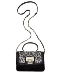 A classic silhouette goes a little wild with this animal print accented design from Anne Klein. Glam signature hardware and ladylike chain-link strap add extra allure, while the surprisingly spacious interior provides plenty of room for wallet, phone, makeup bag and more. A classic silhouette goes a little wild with this animal print accented design from Anne Klein. Glam signature hardware and ladylike chain-link strap add extra allure, while the surprisingly spacious interior provides plenty of room for wallet, phone, makeup bag and more.