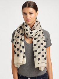 Spotted like a dalmatian, this ultra-soft, wool-blend wrap features a bold polka dot design and logo detail.Wool53 X 70Dry cleanImported Spotted like a dalmatian, this ultra-soft, wool-blend wrap features a bold polka dot design and logo detail.Wool53 X 70Dry cleanImported
