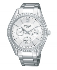 Bring up the lights with a flash of elegance, by Pulsar. Crafted of stainless steel bracelet and round case. Bezel crystallized by Swarovski elements. Silver-tone dial with applied stick indices at markers, three subdials, hour and minute hands, Roman numeral and logo at twelve o'clock, and minute track. Quartz movement. Water resistant to 50 meters. Three-year limited warranty. Bring up the lights with a flash of elegance, by Pulsar. Crafted of stainless steel bracelet and round case. Bezel crystallized by Swarovski elements. Silver-tone dial with applied stick indices at markers, three subdials, hour and minute hands, Roman numeral and logo at twelve o'clock, and minute track. Quartz movement. Water resistant to 50 meters. Three-year limited warranty.