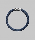 From the Weave Collection. A bold look crafted from braided rubber is accented with a silver chevron clasp. 8mm wide About 8½ long Rubber Imported