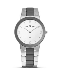 From dusk till dawn, this stainless steel watch from Skagen is the ultimate in sleek, modern design, boasting advanced Japanese quartz movement. Wear it for supreme round the clock style. From dusk till dawn, this stainless steel watch from Skagen is the ultimate in sleek, modern design, boasting advanced Japanese quartz movement. Wear it for supreme round the clock style.