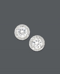 Festive and flaunt-worthy. These Margarita stud earrings make the perfect gift for someone special, or a magical treat for yourself! Round-cut diamonds are encircled by a halo of round-cut diamond accents (1-1/2 ct. t.w.). Set in 14k white gold. Approximate diameter: 5-1/2 mm. Festive and flaunt-worthy. These Margarita stud earrings make the perfect gift for someone special, or a magical treat for yourself! Round-cut diamonds are encircled by a halo of round-cut diamond accents (1-1/2 ct. t.w.). Set in 14k white gold. Approximate diameter: 5-1/2 mm.