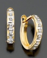 Hoop earrings that deliver a touch of glamour, dressy enough for special occasions but subtle enough for every day. In 14k gold with diamond accents. Approximate diameter: 1/4 inch. Hoop earrings that deliver a touch of glamour, dressy enough for special occasions but subtle enough for every day. In 14k gold with diamond accents. Approximate diameter: 1/4 inch.