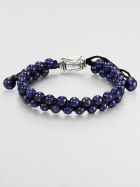 From the Spirited Bead Collection, this two-row beaded bracelet is handsomely crafted from 6mm lapis beads with an adjustable sterling silver beaded clasp.Sterling silverLapisAbout 9 longAbout 3 diam.Imported From the Spirited Bead Collection, this two-row beaded bracelet is handsomely crafted from 6mm lapis beads with an adjustable sterling silver beaded clasp.Sterling silverLapisAbout 9 longAbout 3 diam.Imported