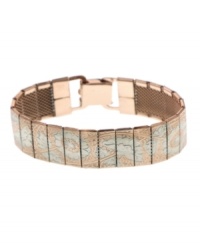Add instant style when you snap this chic bracelet on your wrist. Design by 2028 features an etched surface in silver and rose gold tone mixed metal. Approximate length: 7-1/2 inches. Add instant style when you snap this chic bracelet on your wrist. Design by 2028 features an etched surface in silver and rose gold tone mixed metal. Approximate length: 7-1/2 inches.