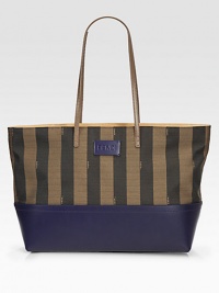 Boldly striped canvas pairs with luxe calfskin leather in this roomy outing essential.Shoulder straps, 10 drop Top zip closure Linen lining 15W X 12H X 5D Made in Italy Boldly striped canvas pairs with luxe calfskin leather in this roomy outing essential.Shoulder straps, 10 drop Top zip closure Linen lining 15W X 12H X 5D Made in Italy