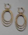 Style that's out of this world. You'll love these orbital hoop earrings by Lucky Brand crafted in mixed metal with a world goldtone finish. Approximate drop: 2 inches. Approximate diameter: 1-1/2 inches.