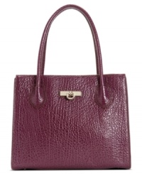 This show-stopping shopper by DKNY will grab attention for all the right reasons. Gorgeous goldtone hardware and a signature charm decorate this fabulous leather design. This show-stopping shopper by DKNY will grab attention for all the right reasons. Gorgeous goldtone hardware and a signature charm decorate this fabulous leather design.